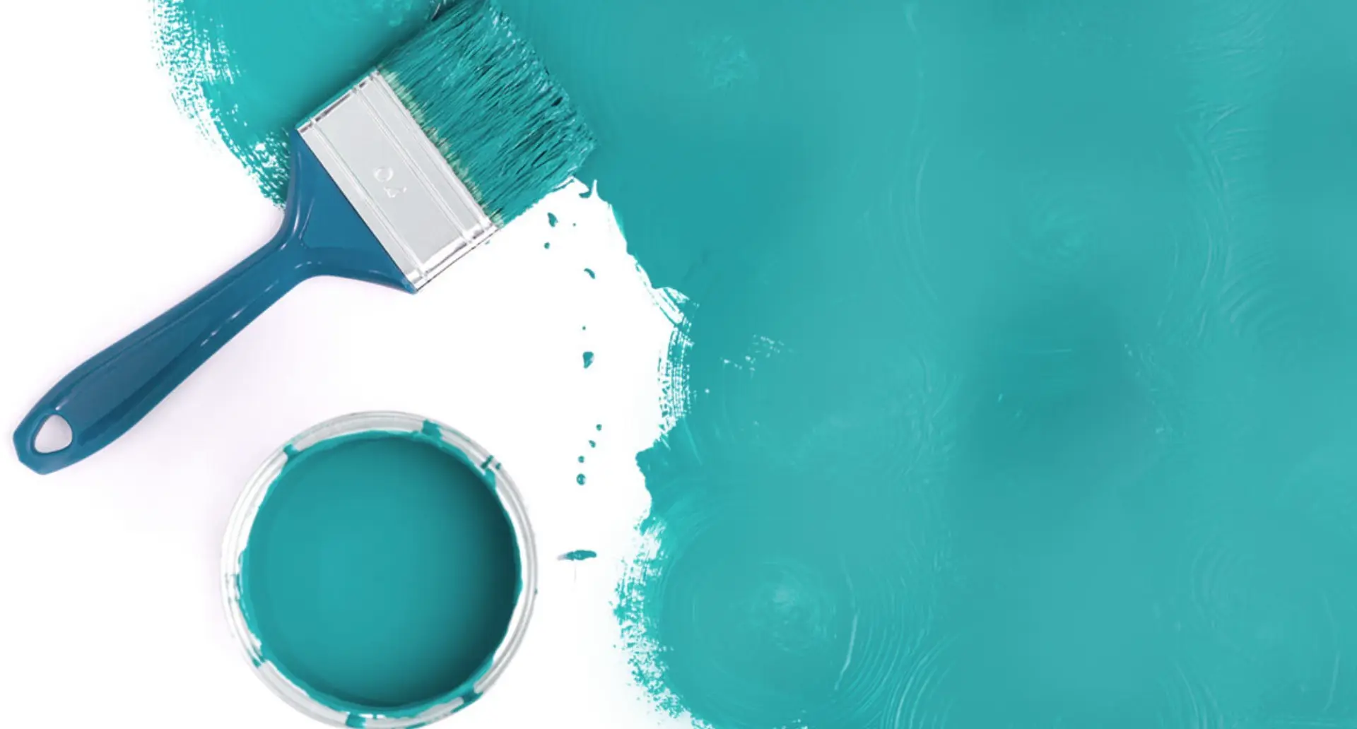 Savannah painter using a brush to apply teal paint, achieving a flawless finish.